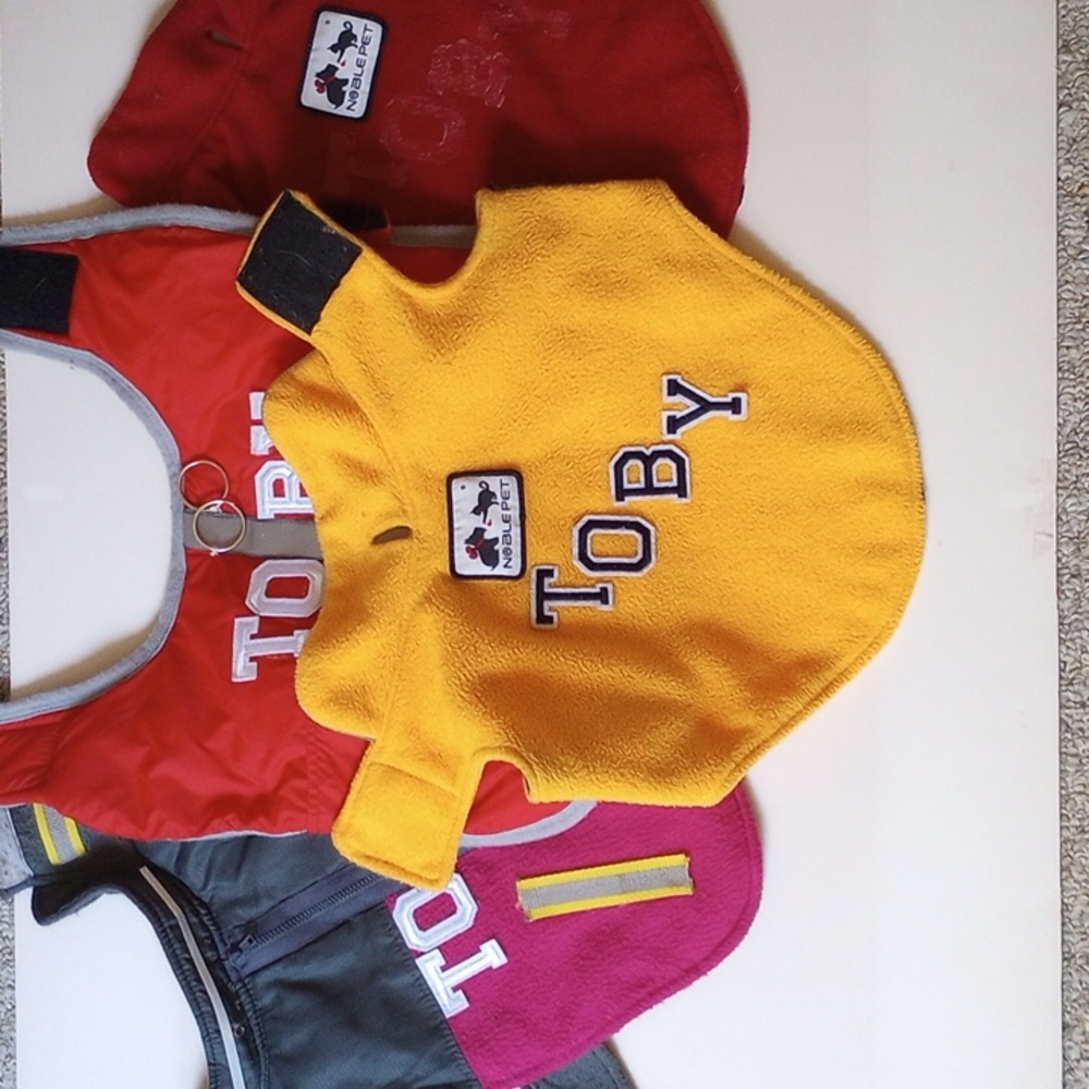 Set of four dog coats by Noble Pet